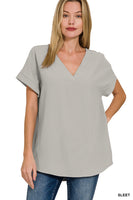 WOVEN AIRFLOW V-NECK HI-LOW HEM TOP