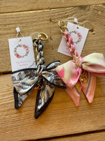 CHARMED BY SATIN BAG CHARMS