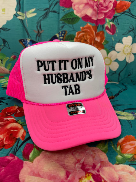 Put It On My Husband’s Tab Trucker Hat